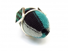 Bead with checker board stones